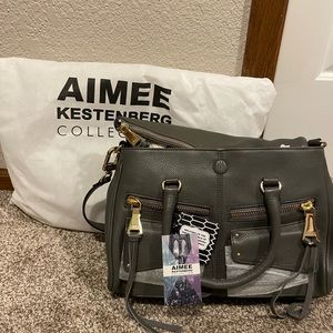 Brand new all leather Aimee Kestenberg charcoal and gold purse/satchel.